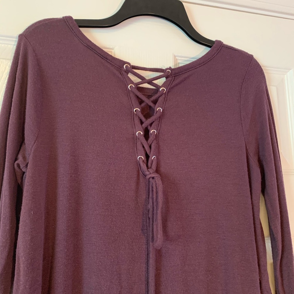 C’isa plum colored blouse laced open backside long